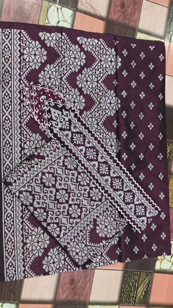 Kain tenun Siak motif Siku Keluang warna Manggis